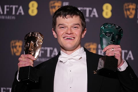 Robert Aramayo poses with the EE rising star award and the award for leading actor for 'I Swear' at the 79th British Academy Film Awards, BAFTA's, in London, Sunday, Feb. 22, 2026. 