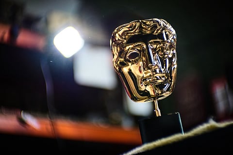 A completed British Academy Film Awards mask sits on a workbench at the FSE Foundry in Braintree, England  