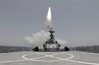 This handout photo released by Iran's Revolutionary Guards Corps (IRGC)'s official website Sepanews on February 17, 2026, shows a rocket being fired during a military exercise by members of the IRGC and navy in the Strait of Hormuz.