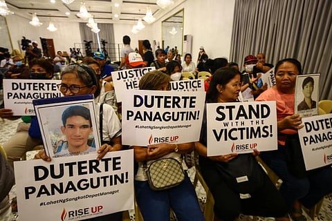 DUTERTE WATCH. Relatives and supporters of alleged extrajudicial killing victims watch the confirmation of charges hearing of former president Rodrigo R. Duterte at the University of the Philippines-Diliman in Quezon City on Monday (Feb. 23, 2026). The International Criminal Court at The Hague, the Netherlands started the first of four sessions to determine if there are enough evidence to try Duterte for crimes against humanity charges related to his anti-drug war as Davao City mayor and as Philippine president. (PNA photo by Joan Bondoc)