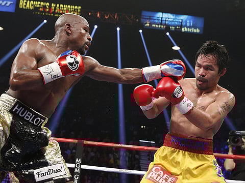Manny Pacquiao will take on Floyd Mayweather Jr. once again in September