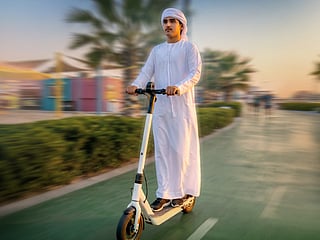 Permit, helmet and designated lanes required under Dubai regulations.
