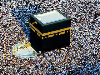 Worshippers gather around the Holy Kaaba during Isha prayers at the Grand Mosque in Makkah. During the holy month of Ramadan, Saudi authorities notice a sharp increase in the number of Umrah worshippers. 