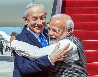 Prime Minister Narendra Modi receives a warm welcome from Israeli Prime Minister Benjamin Netanyahu on his arrival at Ben Gurion International Airport for a two-day state visit to Israel, in Tel Aviv on Wednesday.  