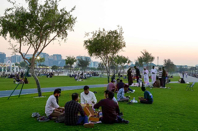 Visitors and residents gather at Old Doha Port in Qatar to break their fast during Ramadan.
