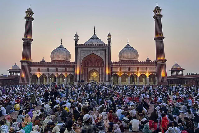 In India and Pakistan, iftar is a vibrant celebration of food and togetherness, with families and communities sharing traditional dishes. Streets near mosques come alive with prayer and laughter. Above, Muslim worshippers break their fast on the first Friday of Ramadan at Jama Masjid in New Delhi, India.