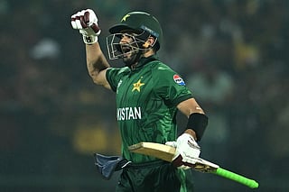 Pakistan's Sahibzada Farhan celebrates after scoring a century (100 runs) during the 2026 ICC Men's T20 Cricket World Cup Super Eights match between Sri Lanka and Pakistan at Pallekele International Cricket Stadium in Kandy on February 28, 2026.