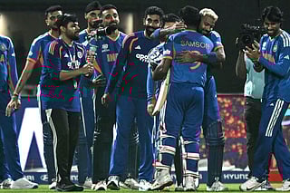 India's players celebrate after their team's win in the 2026 ICC Men's T20 Cricket World Cup Super Eights match between India and West Indies at the Eden Gardens in Kolkata on March 1, 2026.