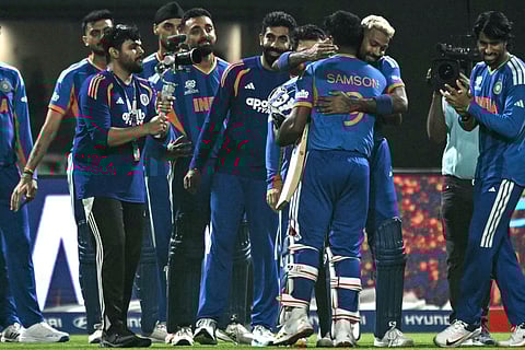 India's players celebrate after their team's win in the 2026 ICC Men's T20 Cricket World Cup Super Eights match between India and West Indies at the Eden Gardens in Kolkata on March 1, 2026.