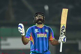 India's Sanju Samson celebrates after scoring a half-century (50 runs) during the 2026 ICC Men's T20 Cricket World Cup Super Eights match between India and West Indies at the Eden Gardens in Kolkata on March 1, 2026.
