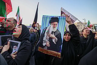 People mourn the death of Iran’s Supreme Leader Ayatollah Ali Khamenei, who was killed in joint US and Israeli strikes, at a square in Tehran on March 1, 2026.