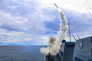 This US Navy handout photo released by US Central Command public affairs shows the Arleigh Burke-class guided-missile destroyer USS Thomas Hudner (DDG 116) firing a Tomahawk land attack missile in support of Operation Epic Fury on March 1, 2026.
