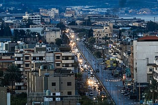 Motorists leave villages in southern Lebanon through the coastal city of Sidon on March 2, 2026.