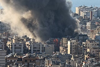 Israeli strikes hit Beirut suburbs after warning