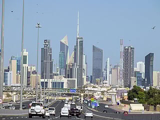 Vehicles drive along the highway leading to and from Kuwait City on March 2, 2026. 