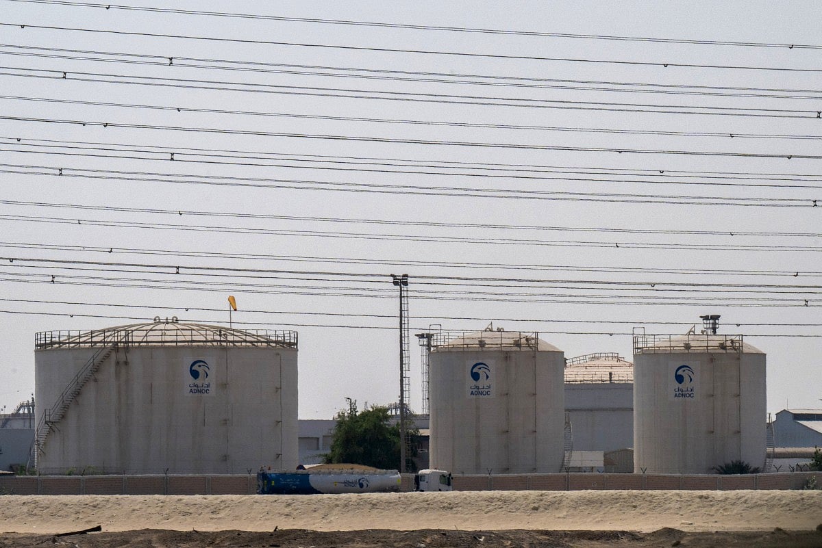 A truck drives past an ADNOC facility in Abu Dhabi on March 3, 2026.