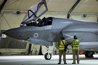 A handout photo taken on March 1, 2026 at the Royal Air Force (RAF) base in Akrotiri in Cyrpus and released by the British Ministry of Defence (MOD) on March 3, 2026 shows F-35B Lightning II Joint Strike Fighters from Britain's Royal Air Force (RAF) before operations across the Middle East.