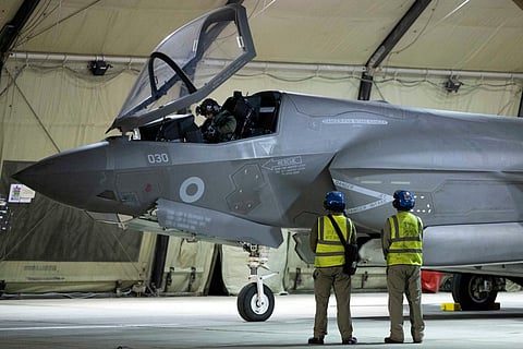A handout photo taken on March 1, 2026 at the Royal Air Force (RAF) base in Akrotiri in Cyrpus and released by the British Ministry of Defence (MOD) on March 3, 2026 shows F-35B Lightning II Joint Strike Fighters from Britain's Royal Air Force (RAF) before operations across the Middle East.
