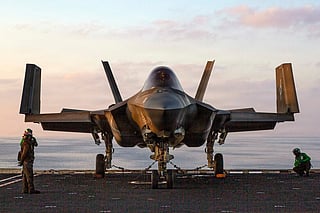 This US Navy handout photo released by US Central Command public affairs shows an F-35C Lightning II, attached to Marine Fighter Attack Squadron (VMFA) 314, chained down on the flight deck of Nimitz-class aircraft carrier USS Abraham Lincoln (CVN 72). Photo taken on March 2, 2026.