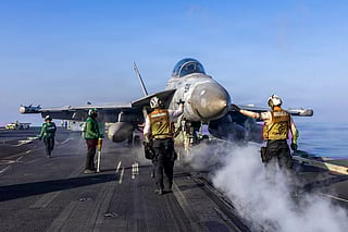 This US Navy handout photo released by US Central Command public affairs shows an EA-18G Growler, attached to Electronic Attack Squadron (VAQ) 133, preparing to launch from the flight deck of Nimitz-class aircraft carrier USS Abraham Lincoln (CVN 72) in support of Operation Epic Fury on March 2, 2026.