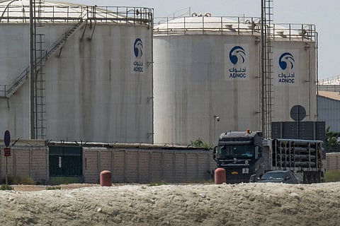 A truck drives past an ADNOC Gas — a subsidiary of the Abu Dhabi National Oil Company — facility in Abu Dhabi on March 3, 2026.