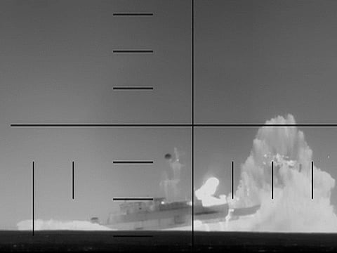 This frame grab from a video released by the US Department of Defense on March 4, 2026, shows what the Department of Defense says is periscope footage of a US Navy submarine firing on and sinking an Iranian warship in the Indian Ocean.