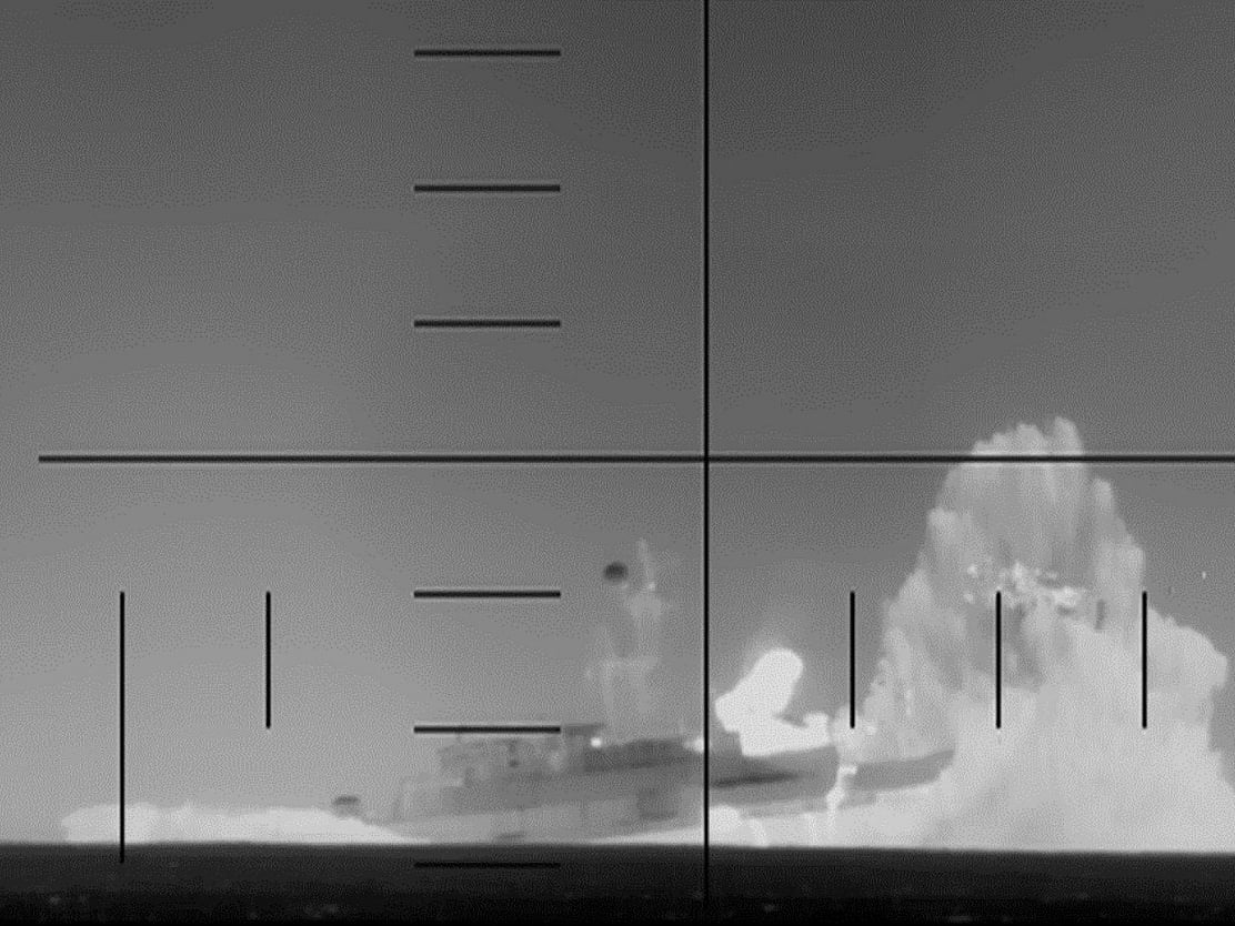 This frame grab from a video released by the US Department of Defense on March 4, 2026, shows what the Department of Defense says is periscope footage of a US Navy submarine firing on and sinking an Iranian warship in the Indian Ocean.