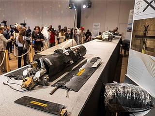 Pieces of missiles and drones recovered after Iran’s strikes are displayed during a press briefing by the UAE government held in Abu Dhabi on March 3, 2026. 
