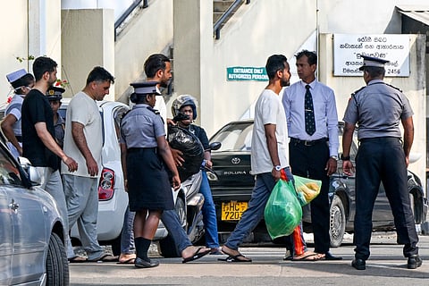 Injured Iranian sailors rescued from their frigate IRIS Dena after a US submarine torpedoed it off Sri Lanka's coast amid the Middle East war, receive treatment at the Karapitiya hospital in Galle on March 5, 2026.