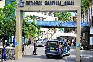 A police vehicle carrying Sri Lanka's Scene of Crime Officers (SOCO) enters the Karapitiya hospital, where the rescued Iranian sailors are being treated, in Galle on March 5, 2026.