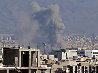 Smoke rises from the site of airstrikes in a central area of the Iranian capital Tehran on March 6, 2026. 