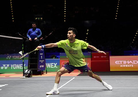 India's Lakshya Sen returns to Canada's Victor Lai during their men's singles semi-final at the All England Open Badminton Championships at the Utilita Arena in Birmingham, central England, on March 7, 2026.