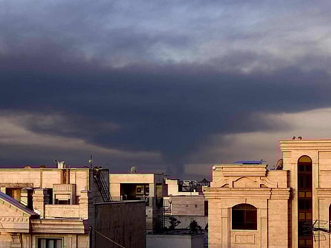 Smoke rises from the site of airstrikes in Tehran on March 7, 2026. 