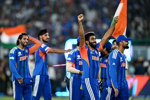 India's players celebrate after winning the 2026 ICC Men's T20 Cricket World Cup final match against New Zealand at the Narendra Modi Stadium in Ahmedabad on March 8, 2026.