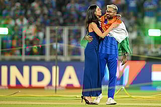 India's Hardik Pandya (R) with his girlfriend and model Mahieka Sharma celebrates after his team's win at the end of the 2026 ICC Men's T20 Cricket World Cup final match between India and New Zealand in the Narendra Modi Stadium of Ahmedabad on March 8, 2026.