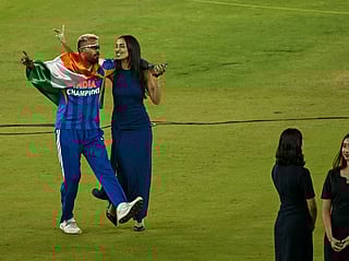 Indian cricketer Hardik Pandya (L) along with his girlfriend and model Mahieka Sharma (2L) celebrates after India's win in the 2026 ICC Men's T20 Cricket World Cup final match against New Zealand at the Narendra Modi Stadium in Ahmedabad on March 8, 2026.
