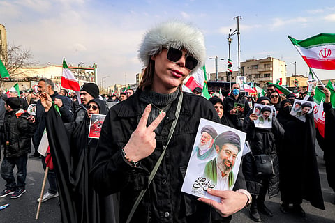 Iranians take part during a rally in support of the country's supreme leader Mojtaba Khamenei and commemorate Eid al-Ghadir in Tehran on June 4, 2026.