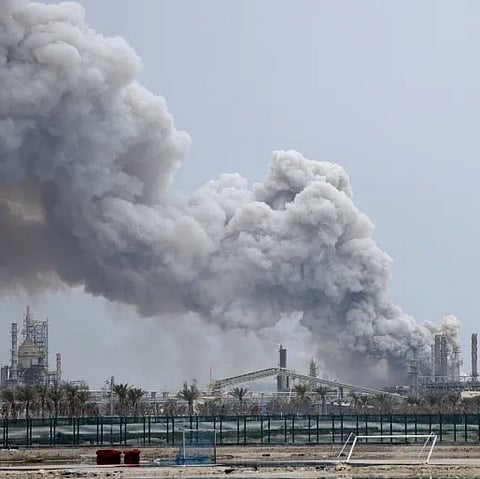 Smoke rises following a strike on the Bapco Oil Refinery in Bahrain.