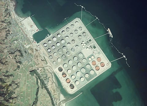 An aerial photograph of Japan's giant Kiire base oil storage facility. 
