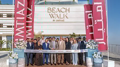 Masih Imtiaz, CEO of Imtiaz Developments, cuts the ribbon to mark the completion and handover of Beach Walk by Imtiaz alongside key members of its in-house construction arm, Venco Imtiaz Construction Company and distinguished guests