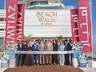 Masih Imtiaz, CEO of Imtiaz Developments, cuts the ribbon to mark the completion and handover of Beach Walk by Imtiaz alongside key members of its in-house construction arm, Venco Imtiaz Construction Company and distinguished guests