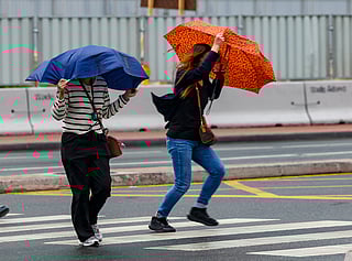 Residents caught in the rain in Dubai