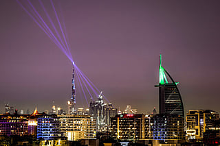 The Burj Khalifa skyscraper (L), the world’s tallest building, and the Burj al-Arab hotel (R) are pictured along the Dubai skyline on March 11, 2026.