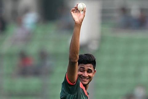 Bangladesh's Nahid Rana shows the ball after his five-wicket haul during the first one-day international (ODI) cricket match between Bangladesh and Pakistan at Sher-e-Bangla National Stadium in Mirpur on March 11, 2026.
