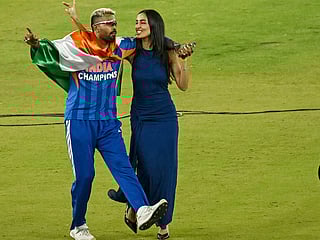 Indian cricketer Hardik Pandya (L) along with his girlfriend and model Mahieka Sharma (2L) celebrates after India's win in the 2026 ICC Men's T20 Cricket World Cup final match against New Zealand at the Narendra Modi Stadium in Ahmedabad on March 8, 2026. 