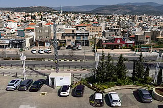 A bomb shelter is seen within a public parking space in the Arab town of Sakhnin in northern Israel near the Lebanese border on March 12, 2026.