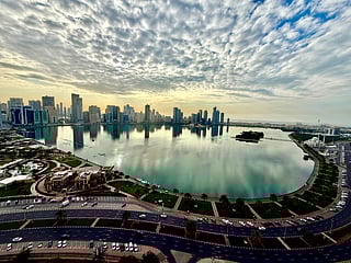 Al Majaz Waterfront in Sharjah, a popular leisure destination featuring the iconic musical fountain, parks, restaurants and scenic views along Khalid Lagoon, captured by Vinod Nambiar.