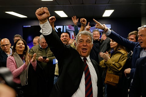 Candidate, Joan Laporta reacts during early voting projections for the election to be president of FC Barcelona soccer club in Barcelona, Spain, Sunday, March 15, 2026. (AP Photo/Joan Monfort)