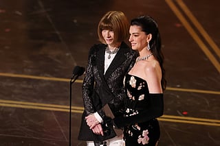 Anna Wintour and Anne Hathaway speak onstage during the 98th Oscars at Dolby Theatre on March 15, 2026 in Hollywood, California.