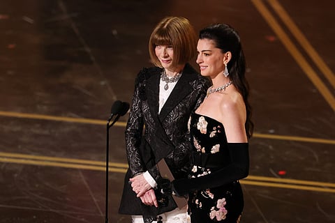 Anna Wintour and Anne Hathaway speak onstage during the 98th Oscars at Dolby Theatre on March 15, 2026 in Hollywood, California.